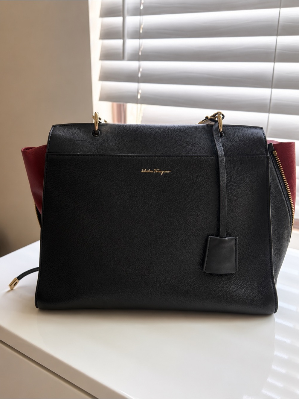 Salvatore Ferragamo Black and Burgundy Top-Handle Women's Bag with Gold Hardware - Picture 2 of 6